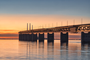 The Oresund Bridge between Denmark and Sweden at sunset