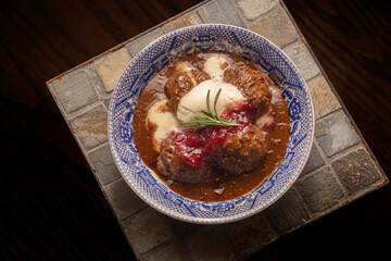 spicy asian meatballs with goat cheese and cranberry relish