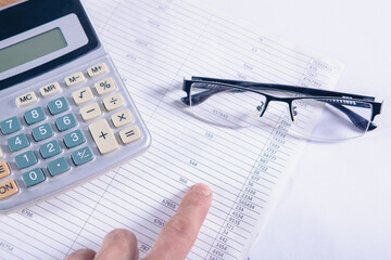 Naklejka na ściany i meble Close up calculator and financial report - accounting concept