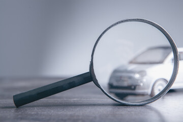 magnifying glass and car search car