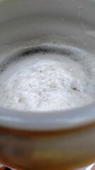 pouring beer into a glass