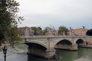 Fototapeta na wymiar City landscape with bridge bridge in Rome, Italy