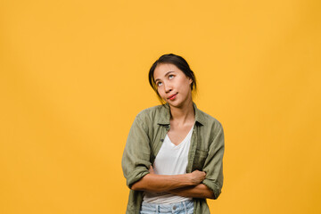 Portrait of young Asia lady with negative expression, excited screaming, crying emotional angry in...