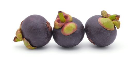Fresh whole and half mangosteens isolated on white background.