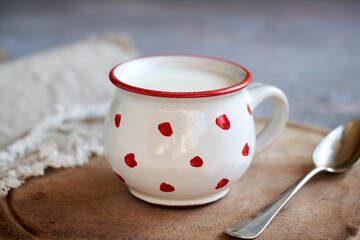 Homemade kefir in a cup on a table