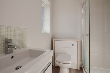 Modern brand new shower room and toilet