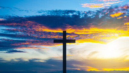 The Cross at the sunset background