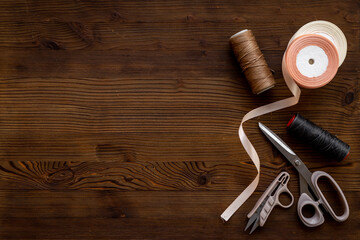 Sewing background with tailor and knitting accessories. Tailoring scissors