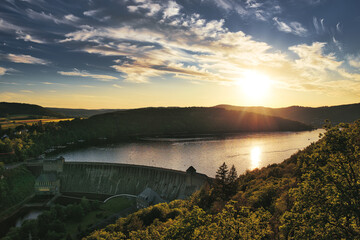 Edersee dam wall Germany in the sunset. Clouds in the sky