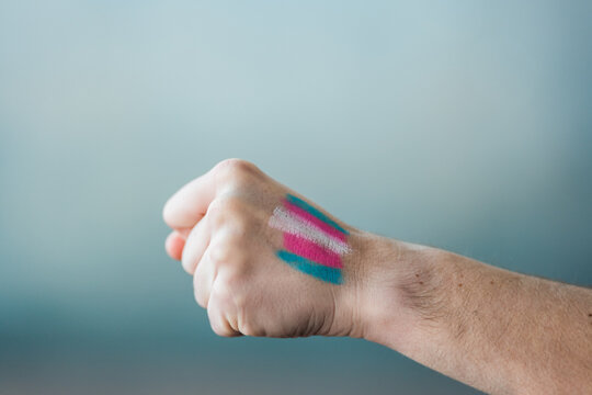 Hand with transgender flag