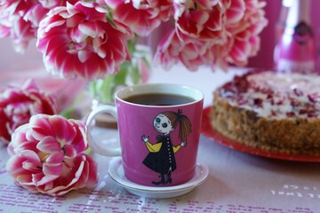 cup of coffee and flowers