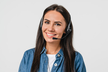 Smiling young caucasian hotline helpline worker, IT customer support manager in headset looking at...