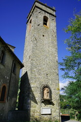 Fototapeta na wymiar Bell tower of the church of San Jacopo a Gallicano in Garfagnana, Tuscany, Italy
