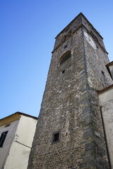 Fototapeta na wymiar Bell tower of the church of San Jacopo in Borgo a Mozzano in Garfagnana, Tuscany, Italy