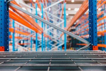 Photo of an empty industry factory, a lot of shelves.