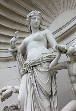 Close-up of the neoclassic marble statue of Tethys on the facade of the Lloyd Palace in Trieste, Italy