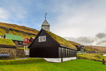 Fototapeta na wymiar View of the Kollafjordur Church, Kirkja on Streymoy island, Faroe Islands.