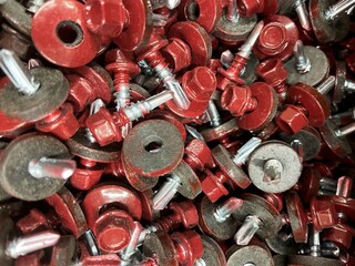 Red self-tapping screw with press washer for fixing wave soft slate, ondulin.