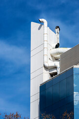 Fototapeta premium Ventilation pipes of a modern building in Barcelona, Spain
