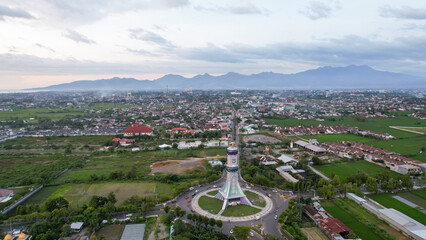 Fototapeta na wymiar Aerial view of The extraordinary and beautiful building of the Mataram City metro monument. Lombok, Indonesia, March 22, 2022