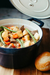 Vertical Shot of Stew in a Blue and White Pot