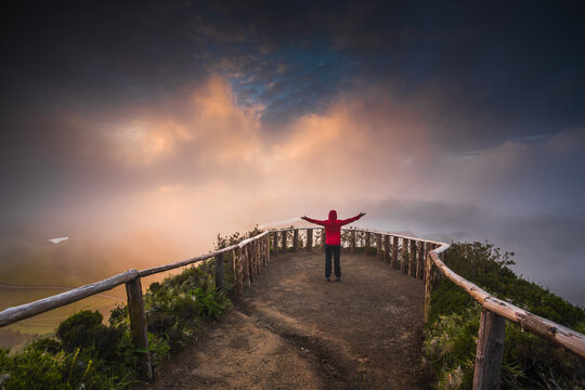 Woman Enjoying the sunset and the great view