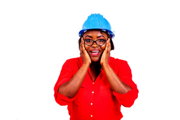 surprised engineer woman holding both hands on her cheeks smiling.