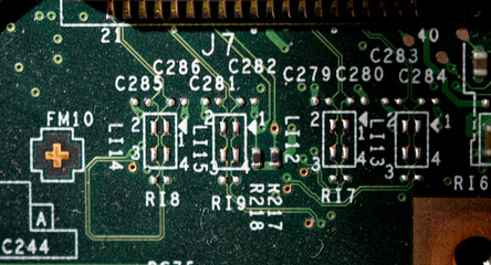 Old dusty and dirty laptop circuit board close-up