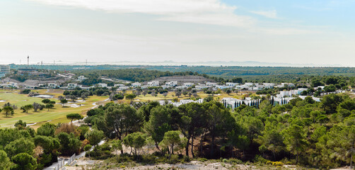 Panoramic view Las Colinas luxury residences and golf course. Spain