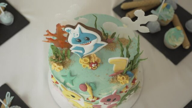 Decorated children's cake with sharks. Birthday cake for children
