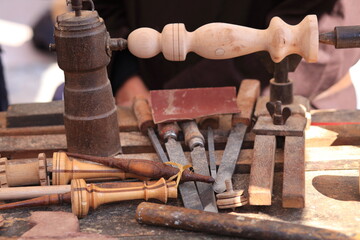 carpenter with pedal lathe wood craftsmen