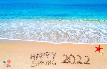 Happy Spring 2022 on a tropical beach