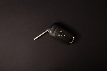 Stylish car keys, background photo, key details