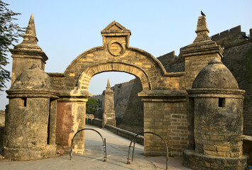 Entrance arch or front gate arch of Diu Fort, a sixteenth century fort which is a popular tourist attraction located in Diu, India