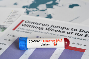 Fototapeta premium Blood tube for test detection of virus Covid-19 Omicron BA.2 Variant with positive result on papers document.
