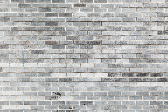 Fototapeta Gray brick wall, frontal background texture