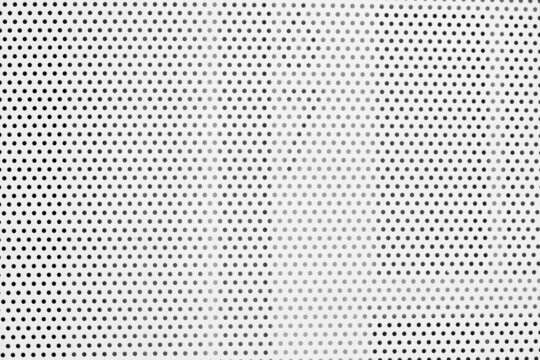 Partial white grated steel door.