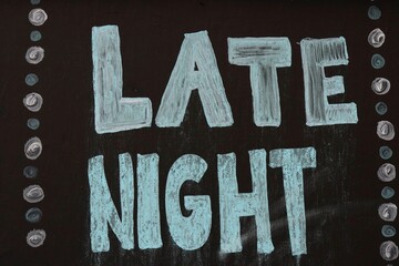 Blue Lettering Sign Late Night