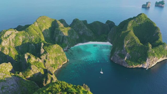 Aerial view of Phi Phi islands Travel Landmark of Krabi Phuket, Thailand. Amazing Drone footage over Maya beach with beautiful blue turquoise seawater. Tourist attraction in summer holidays.