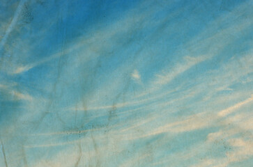 Obraz premium Vintage background in the blue sky with clouds