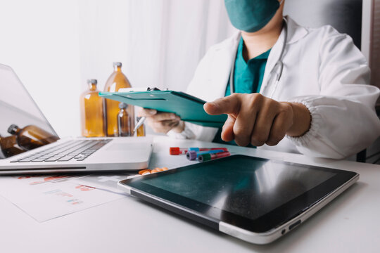 Medicine doctor using tablet with digital medical interface icons, Medical technology and network concept.