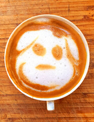 a very tasty cappuccino on the wood table