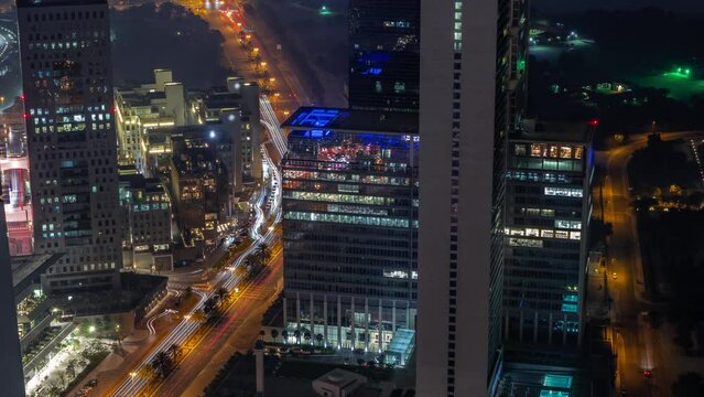 Office skyscrapers in financial district aerial all night timelapse