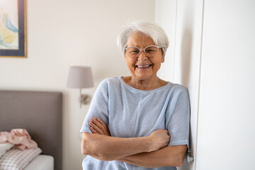 Portrait of smiling senior woman at home

