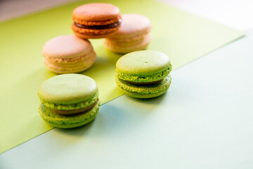 creative style of colorful french cookies macarons. Pop art style banner.macaroons. creative still life with french delicious dessert cookies on colorful background,top view