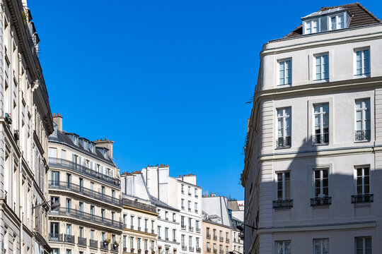 Paris, beautiful buildings, near the Palais-Royal, in the 2e arrondissement, blue sky
