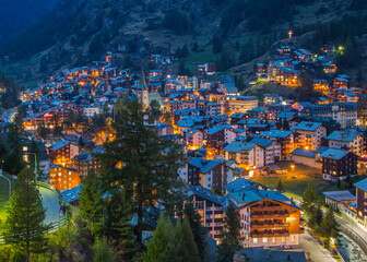 The sacred cross can be seen on the hill overlooking the town of Zermatt, Switzerland