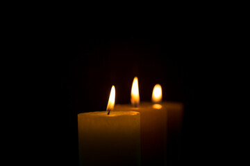 Warm candlelight on a dark mysterious background