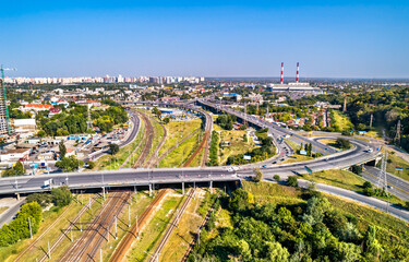 Aerial view of a road and railway interchange Vydubychi in Kiev, Ukraine before the Russian invasion