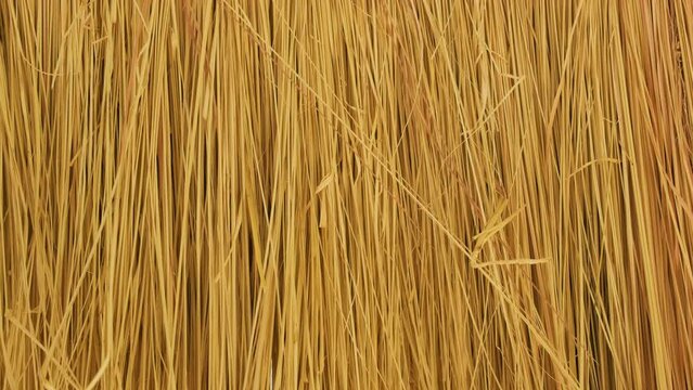Close up of yellow striped straw texture as background